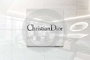 Christian dior on glossy office wall realistic texture